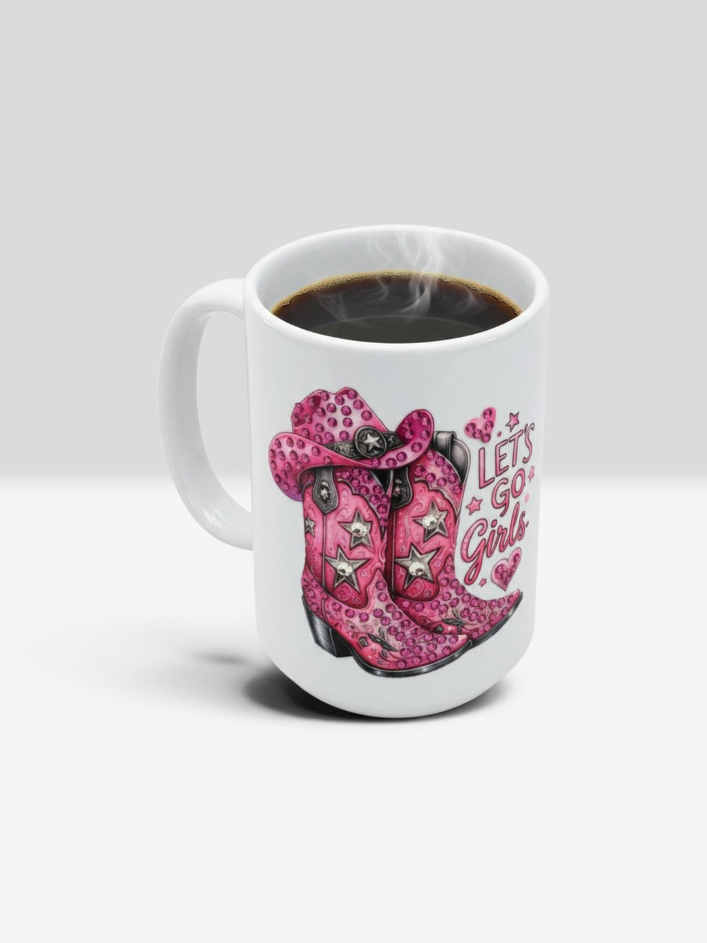 Finish Touch Accessories white ceramic mug featuring a pink cowboy boot graphic with star accents and Let's Go Girls text