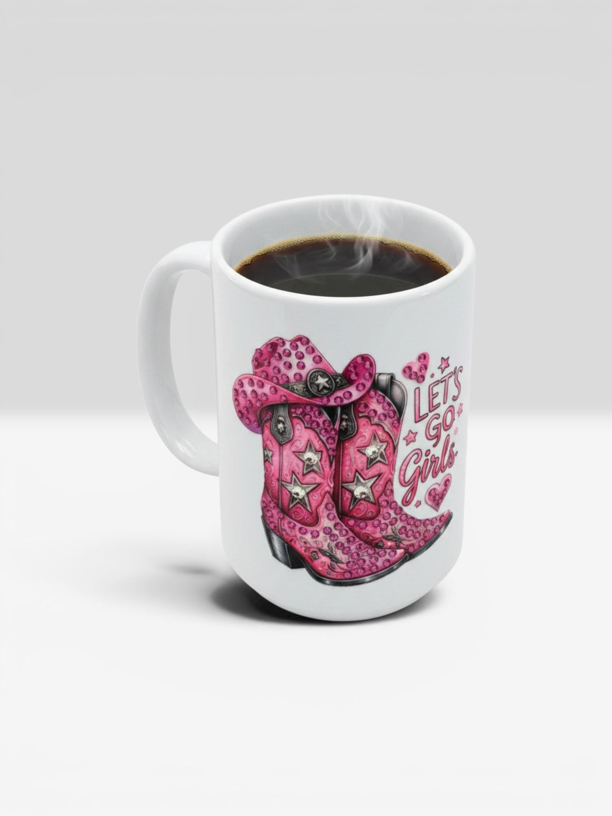 Finish Touch Accessories white ceramic mug featuring a pink cowboy boot graphic with star accents and Let's Go Girls text